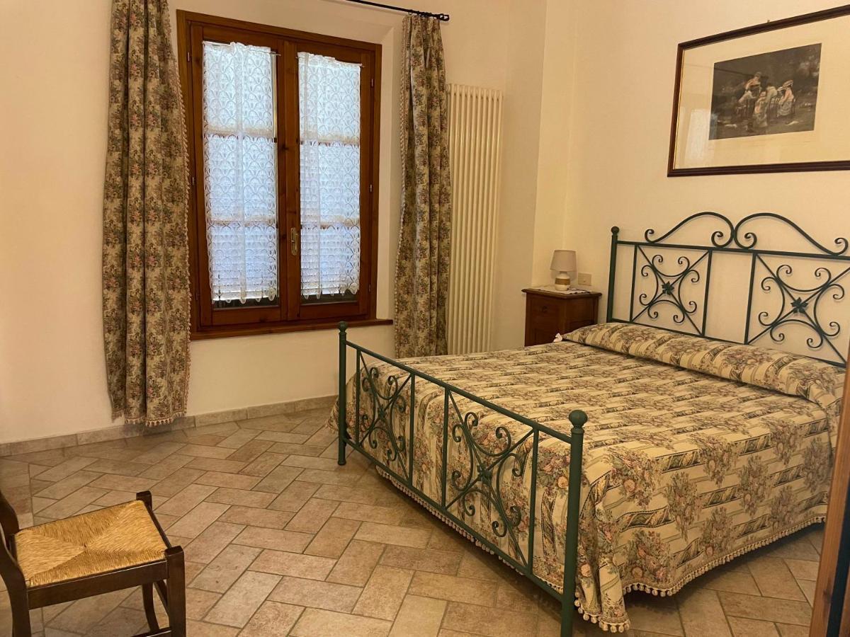 Casa Vacanza Le Case ซานจีมิญญาโน ภายนอก รูปภาพ
