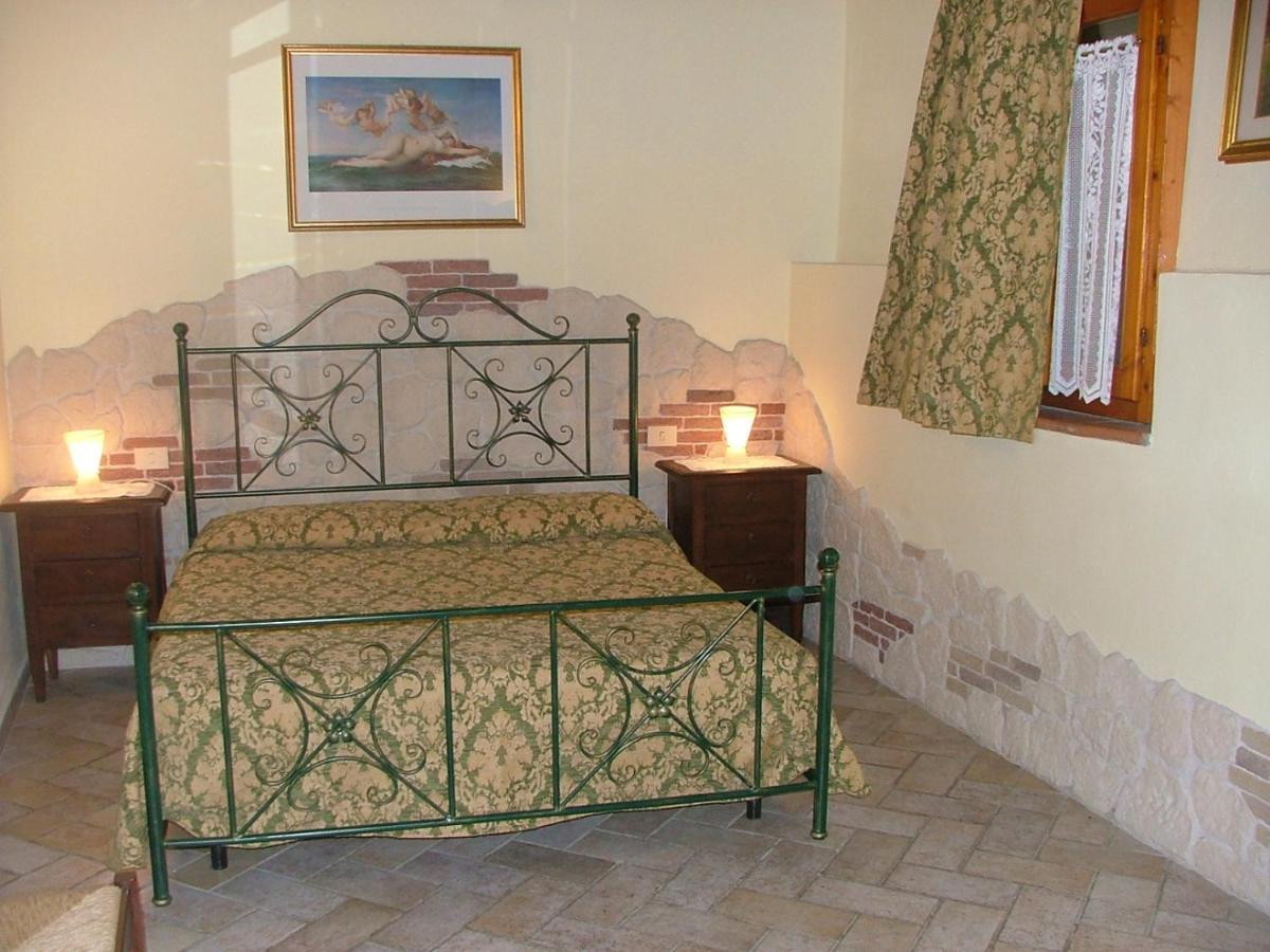 Casa Vacanza Le Case ซานจีมิญญาโน ภายนอก รูปภาพ