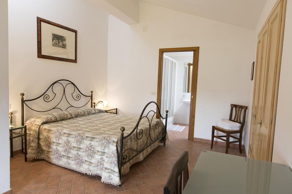 Casa Vacanza Le Case ซานจีมิญญาโน ภายนอก รูปภาพ